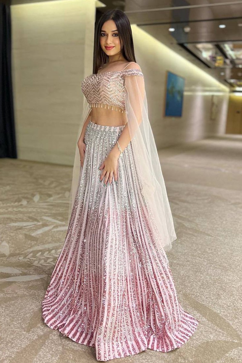 Buy Jannat Zubair In Kalki Powder Peach Lehenga Choli With Hand Embroidery  Using Turquoise And Pink Sequins Work