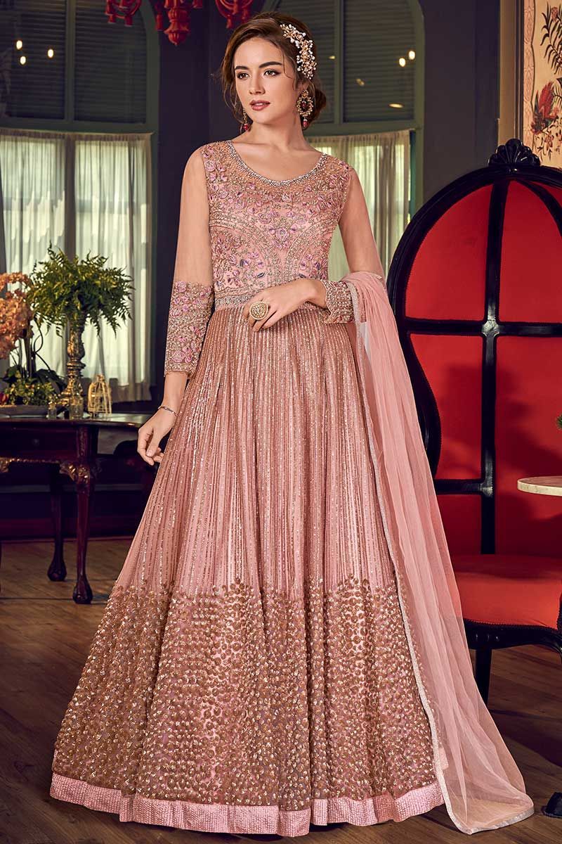 BABY PINK TO ROSE PINK CHIKAN GOWN SET WITH A GOLD DETAILED BODICE PAIRED  WITH A MATCHING BY SCALLOPED DUPATTA AND GOLD EMBELLISHMENTS. - Seasons  India