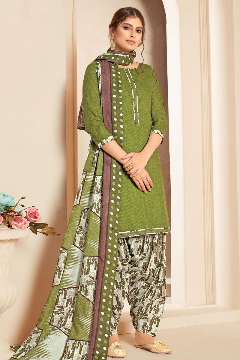 green superior cotton punjabi suit in self print with fancy stitching neck fj12371