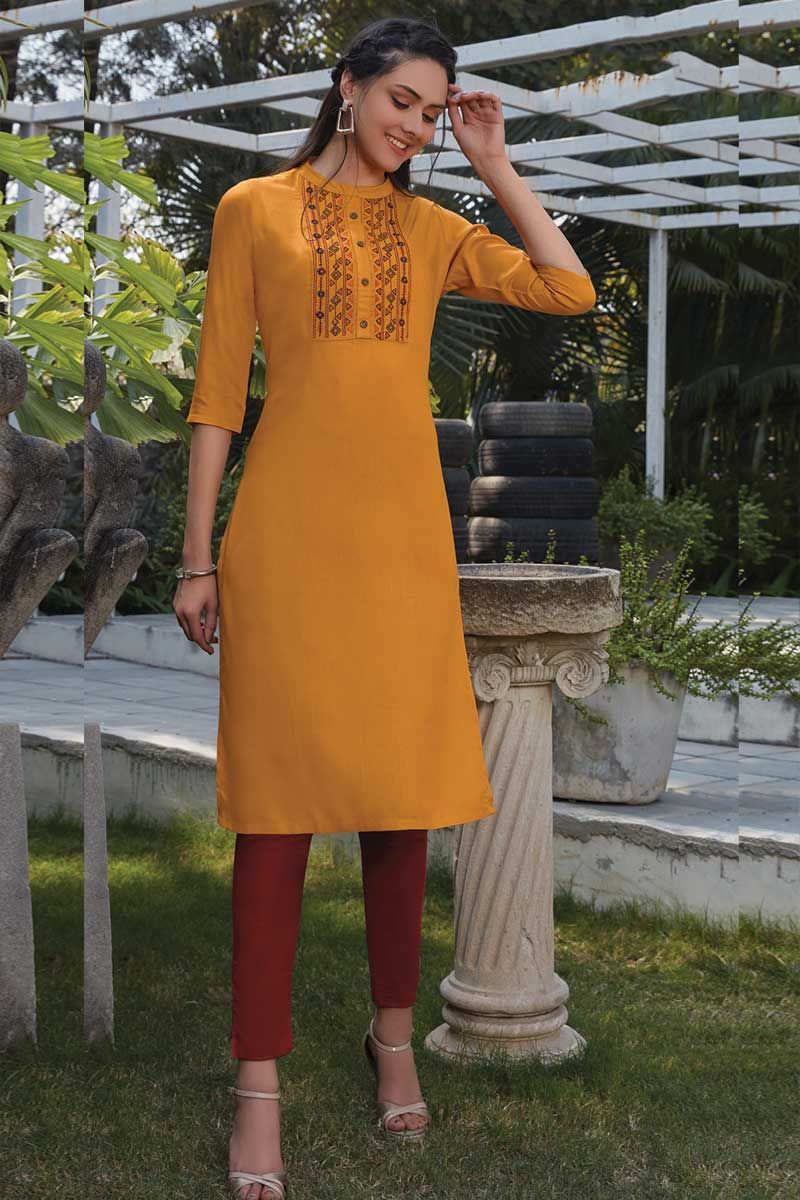 Yellow long kurti with floral prints and adda work  Kurti Fashion