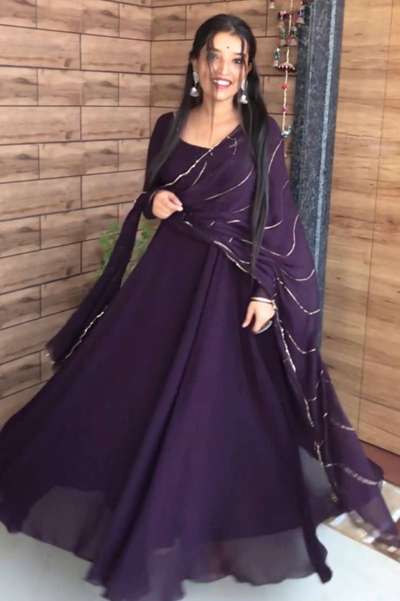 Purple Colour Heavy Stone work Net Sleeveless Gown With Exquisite Detailing